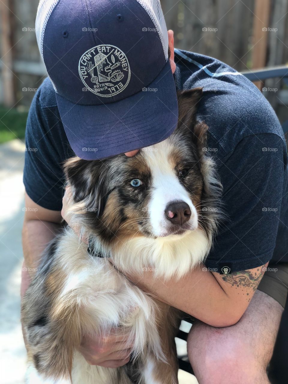 My fiancé and our Aussie in Boise, Idaho. We were just hanging out in the backyard of our Airbnb and I snapped this photo with my IPhone 7Plus. 