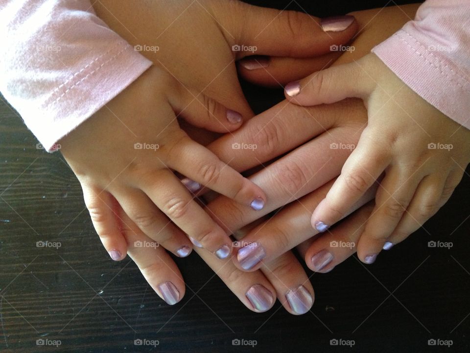 Hand in hand. Mother and daughter