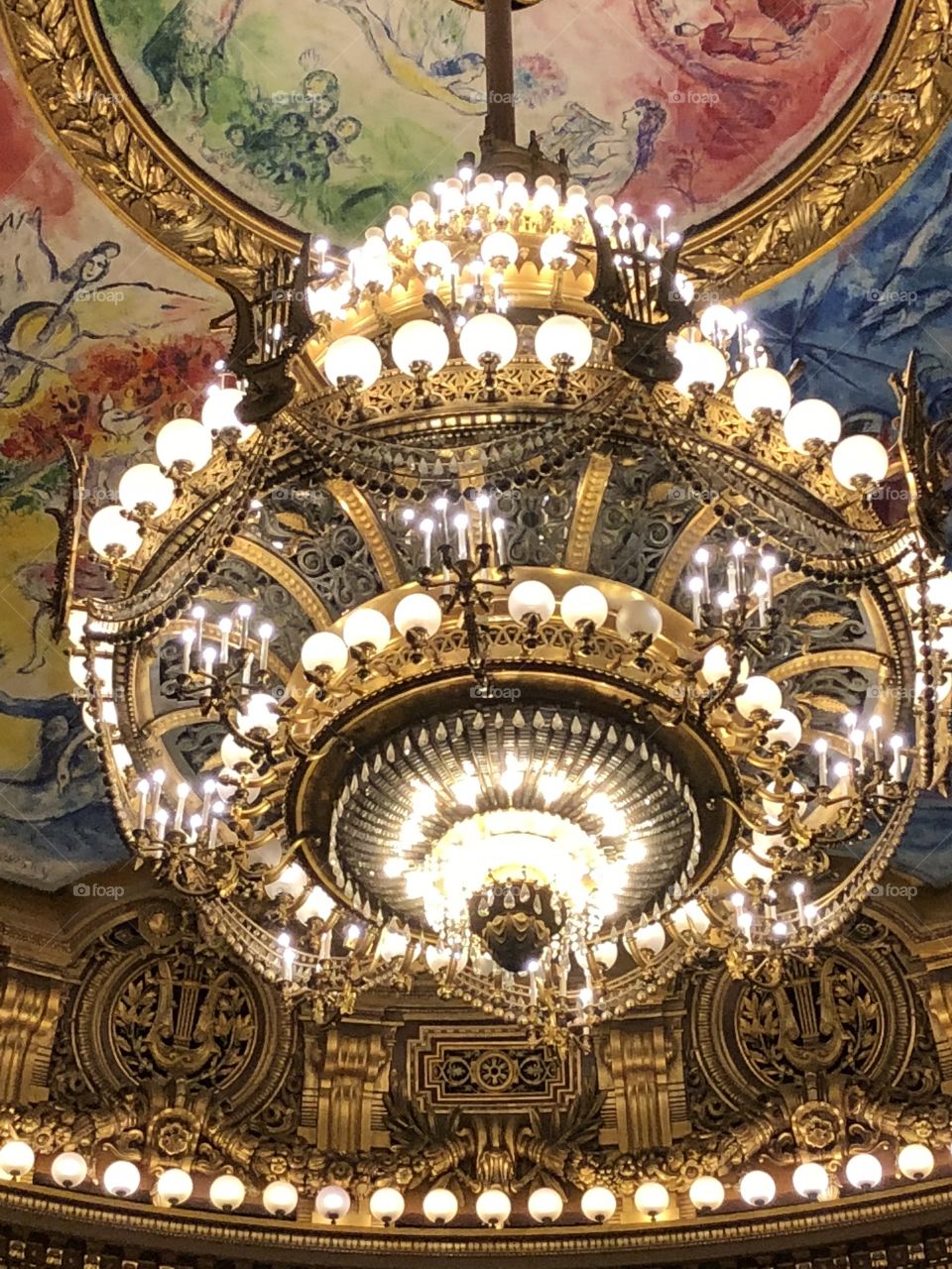 The iconic chandelier which inspired the design of the chandelier from Phantom of the Opera, as seen in the Garnier Opera House in Paris, France. 