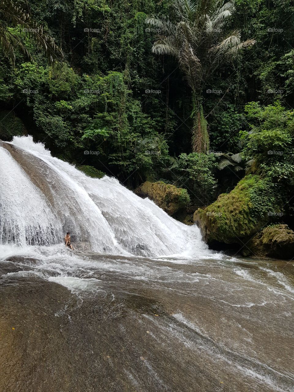 Cool waterfall in the forest. This is in national park in Makassar, Indonesia.