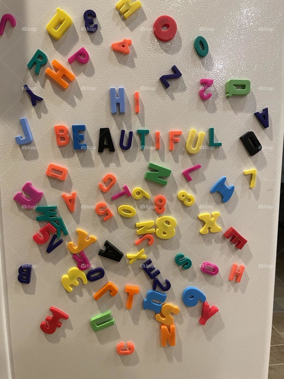 Messages on the fridge, hi beautiful, spelling positive messages, magnetic letters on the refrigerator, positive vibes on the fridge 