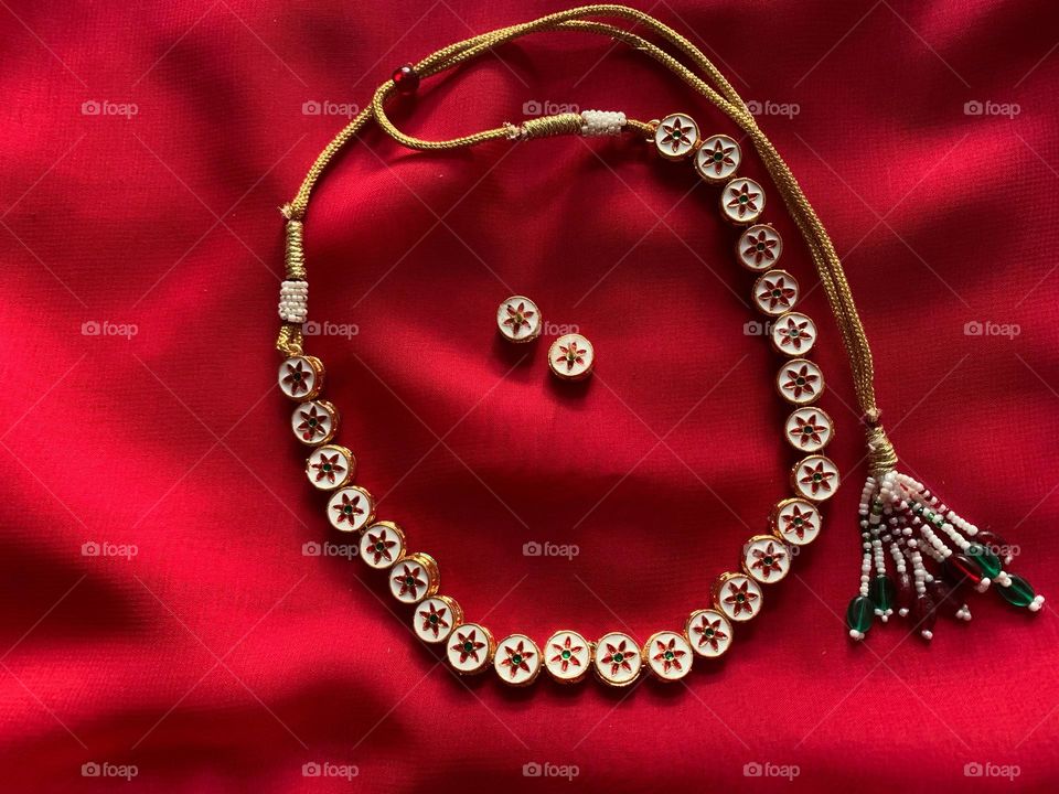 Necklace with Meenakari work.Jaipur is the main centre of Meenakari. This art was brought to Rajasthan by Raja Man Singh of Amber in 16 th century.