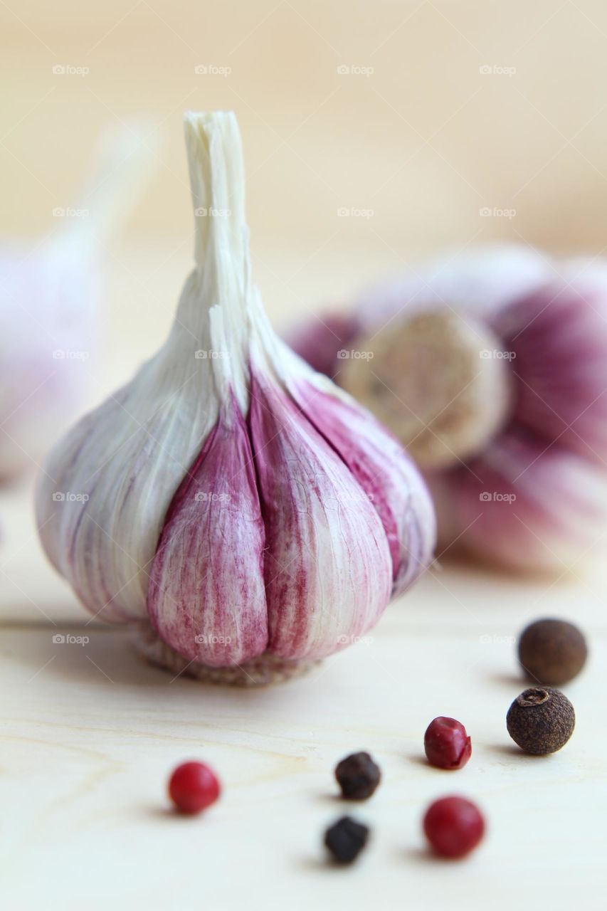 Fresh garlic on a wooden board