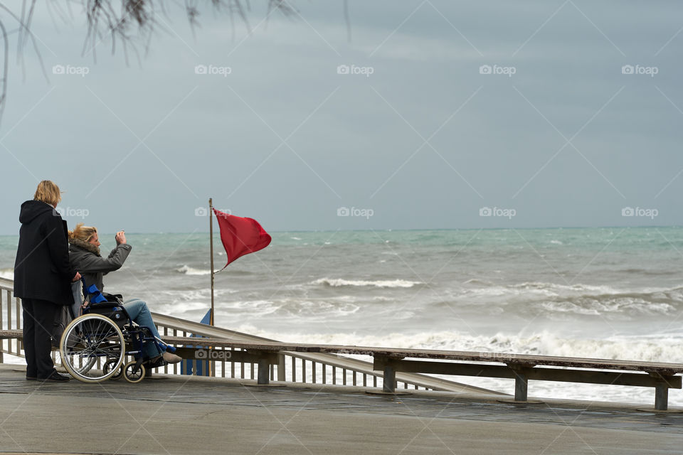 Photographing the waves from a wheelchair 