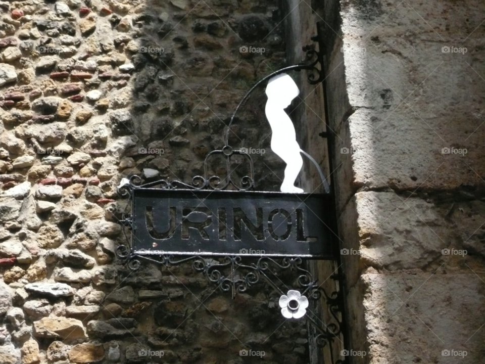 sign boy man stone by nivoa