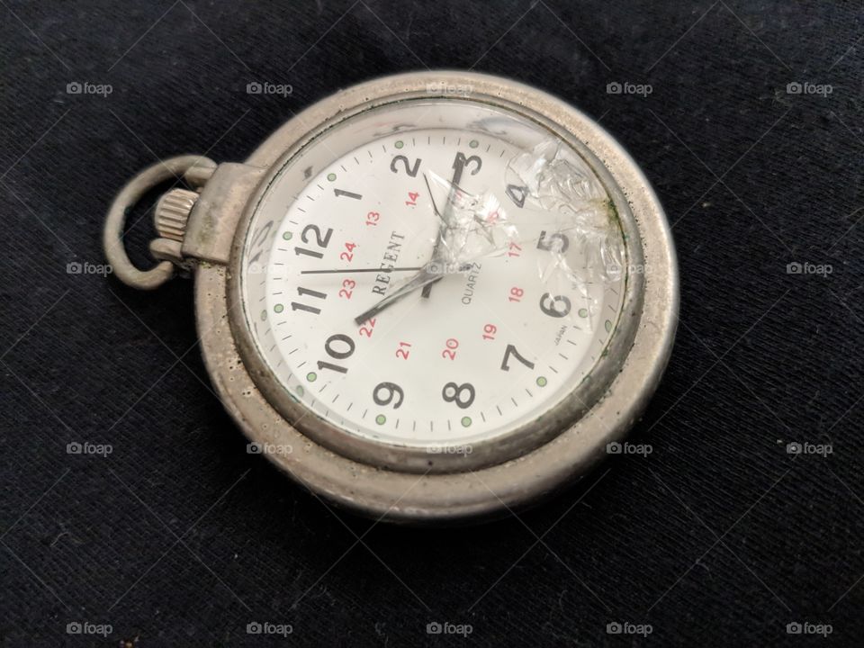 Watch with Broken Glass Face