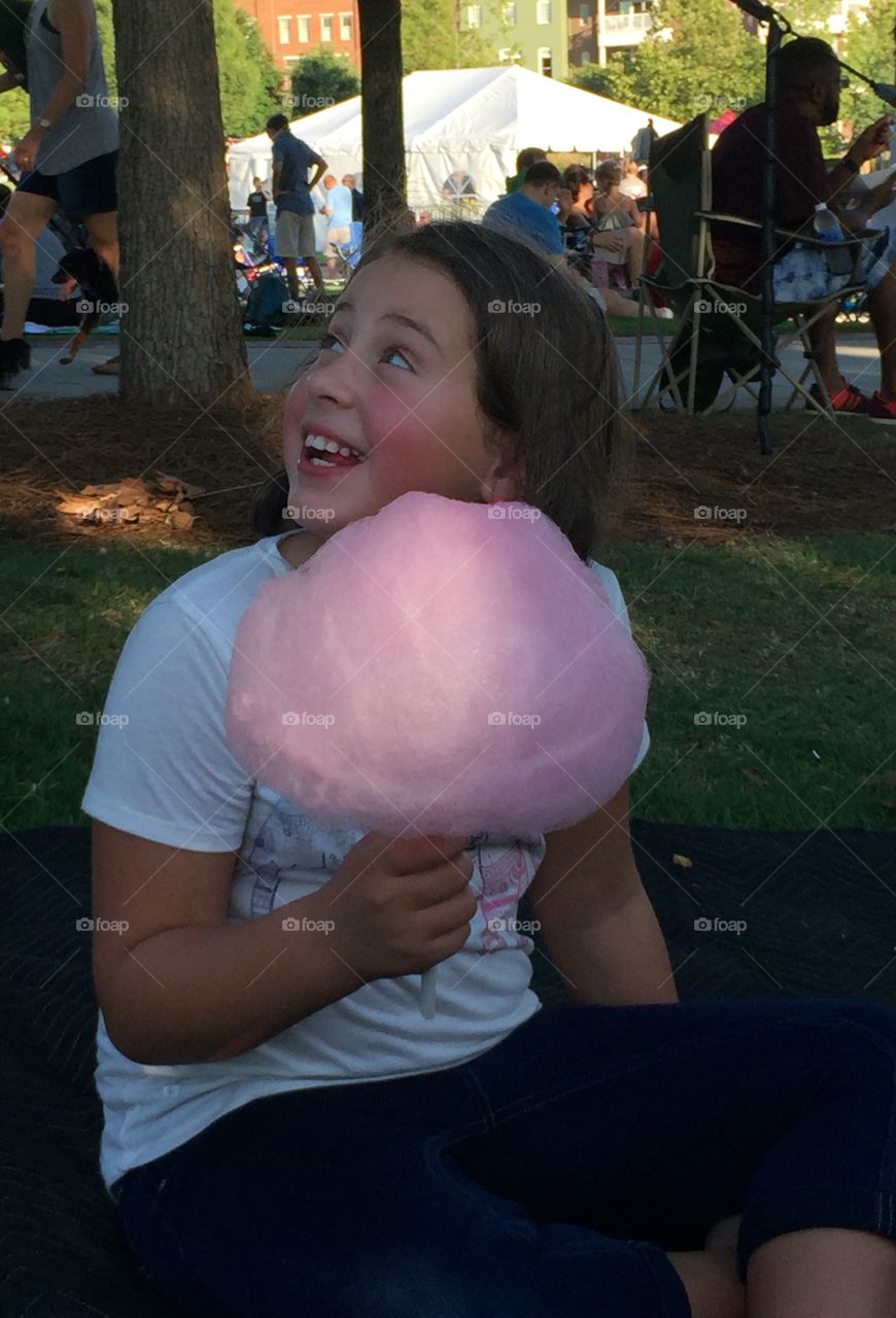 Girl holding sugar candy