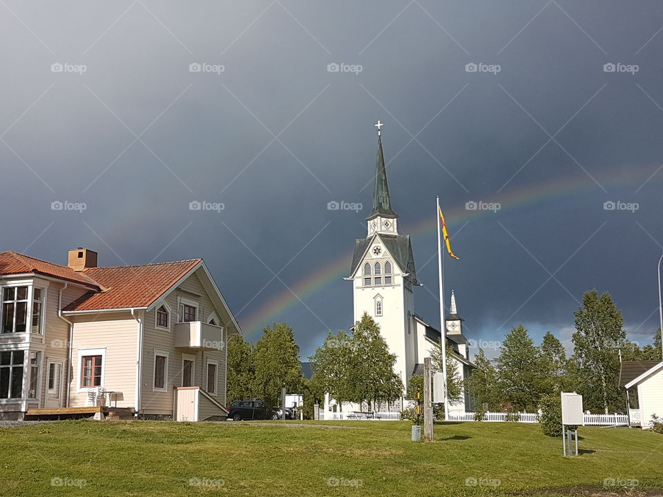 Rainbows and a church.