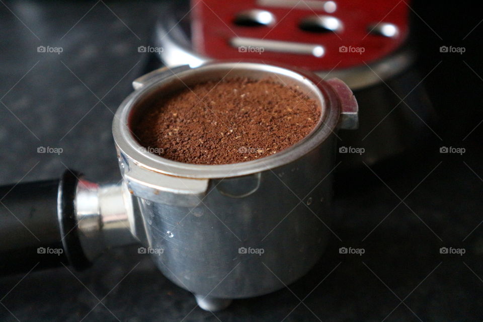 Ground coffee in handle