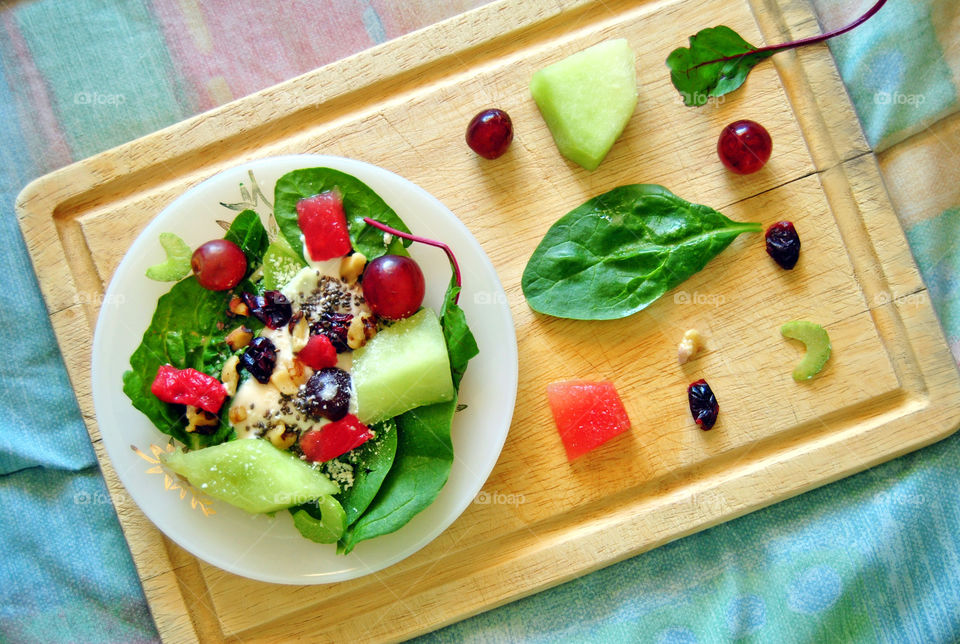 Healthy salad on wooden