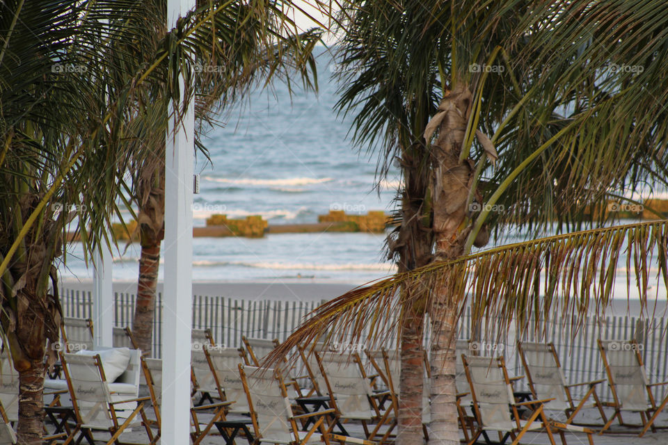 Looking through beach club towards an old Pier destroyed by Hurricane Sandy