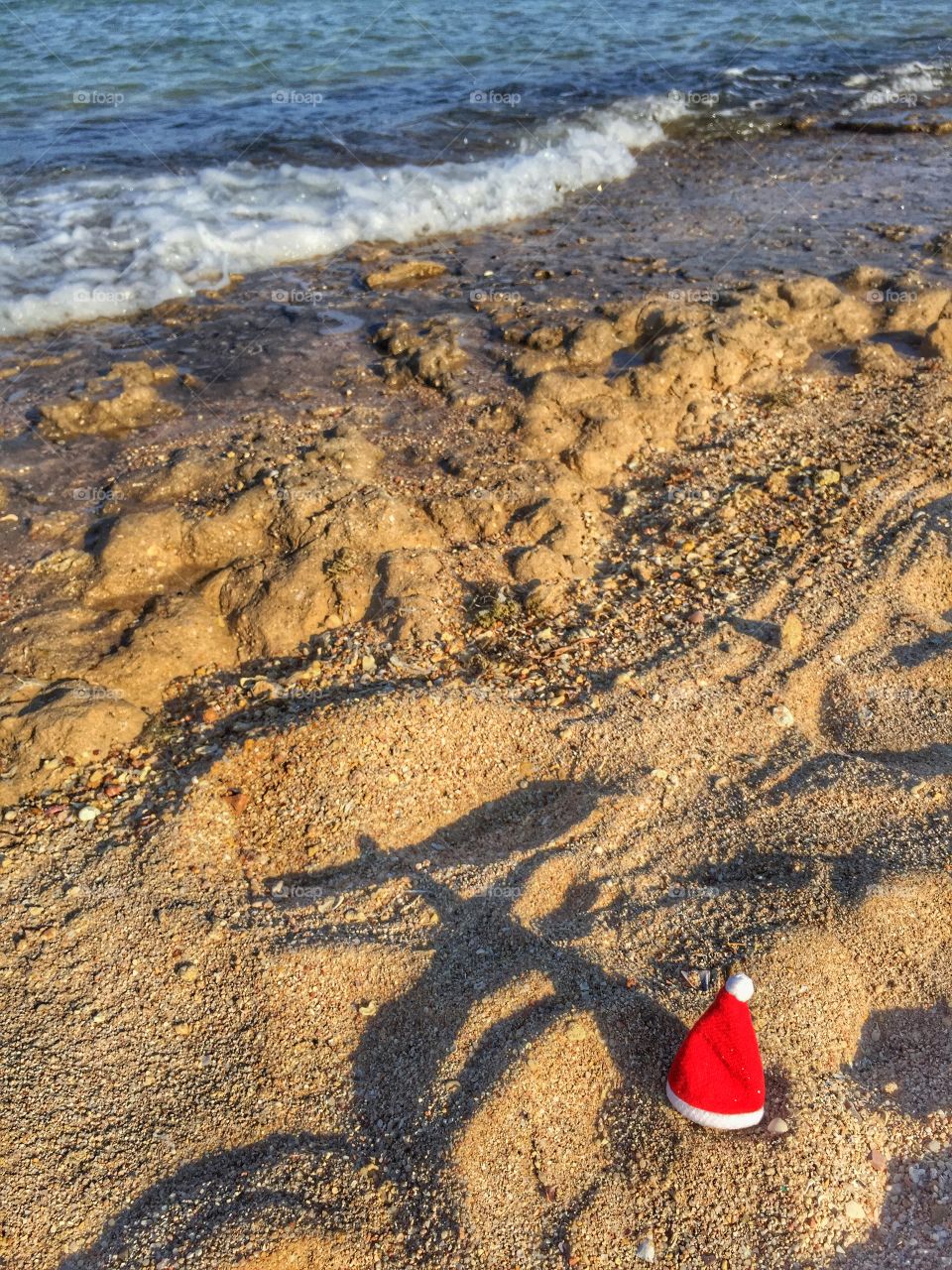 Santa hat on the beach