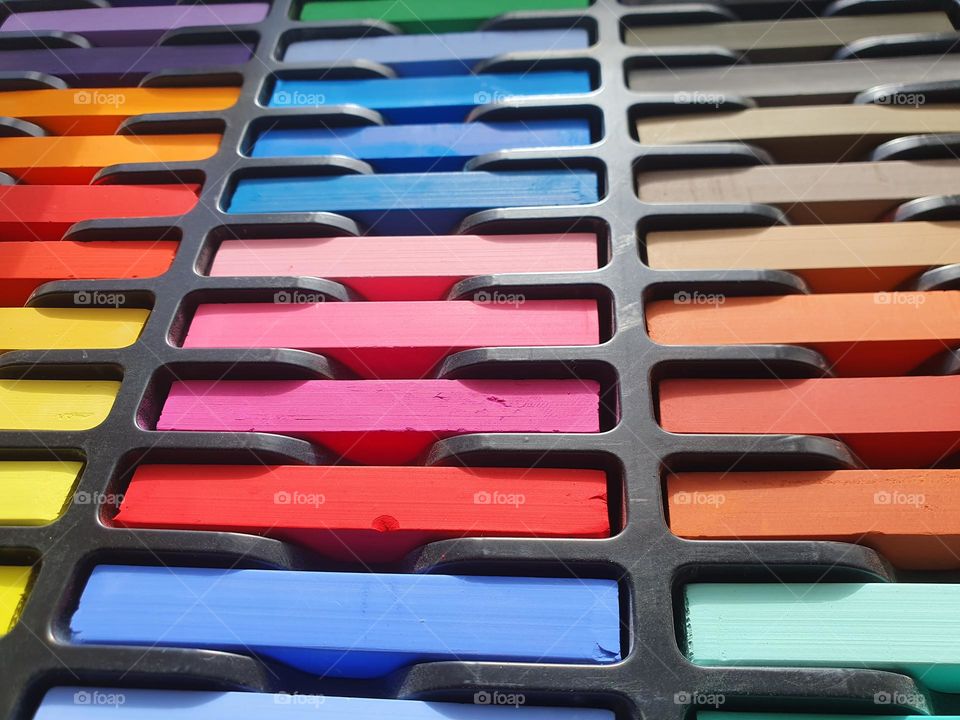 rectangle  - chalk - crayons in a box in fantastic colors