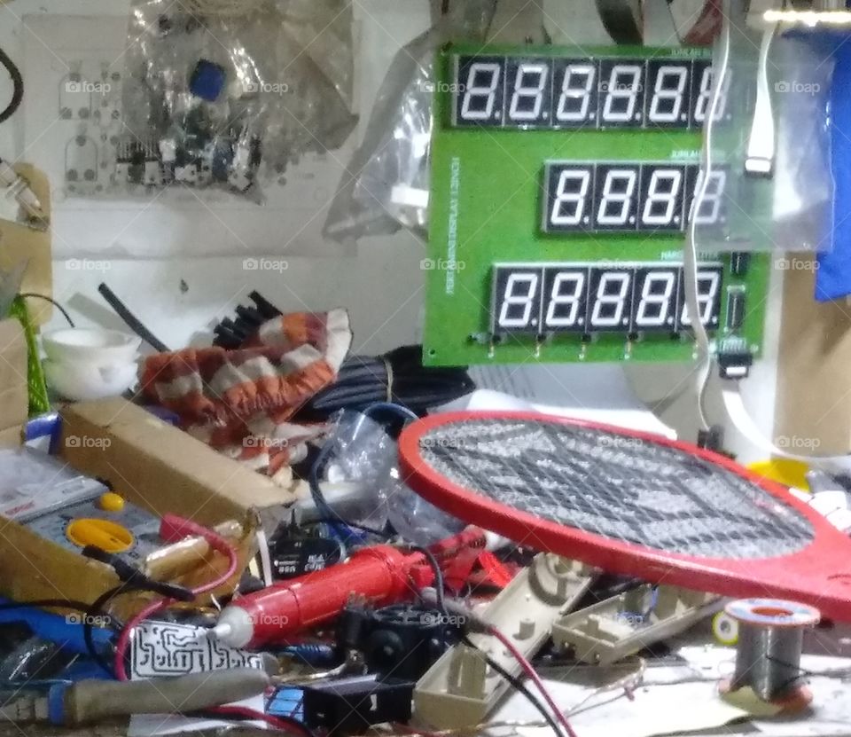 Messy no one tidying up if electronics repair work is getting sleepy