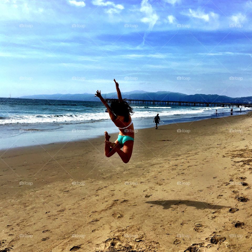 Jumping for Joy. Taken on Venice Beach in Los Angeles, CA