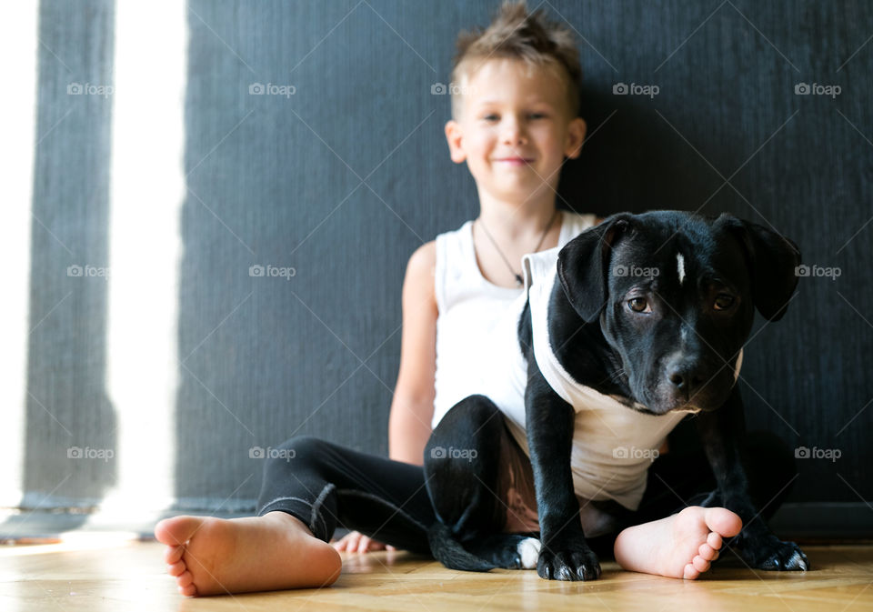 Cute little dog and boy