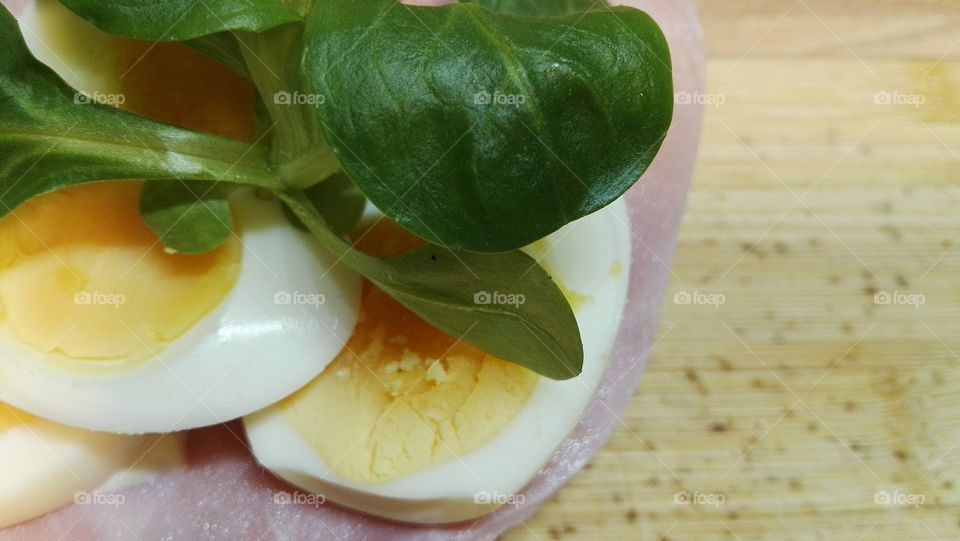 sandwich with ham egg and salad