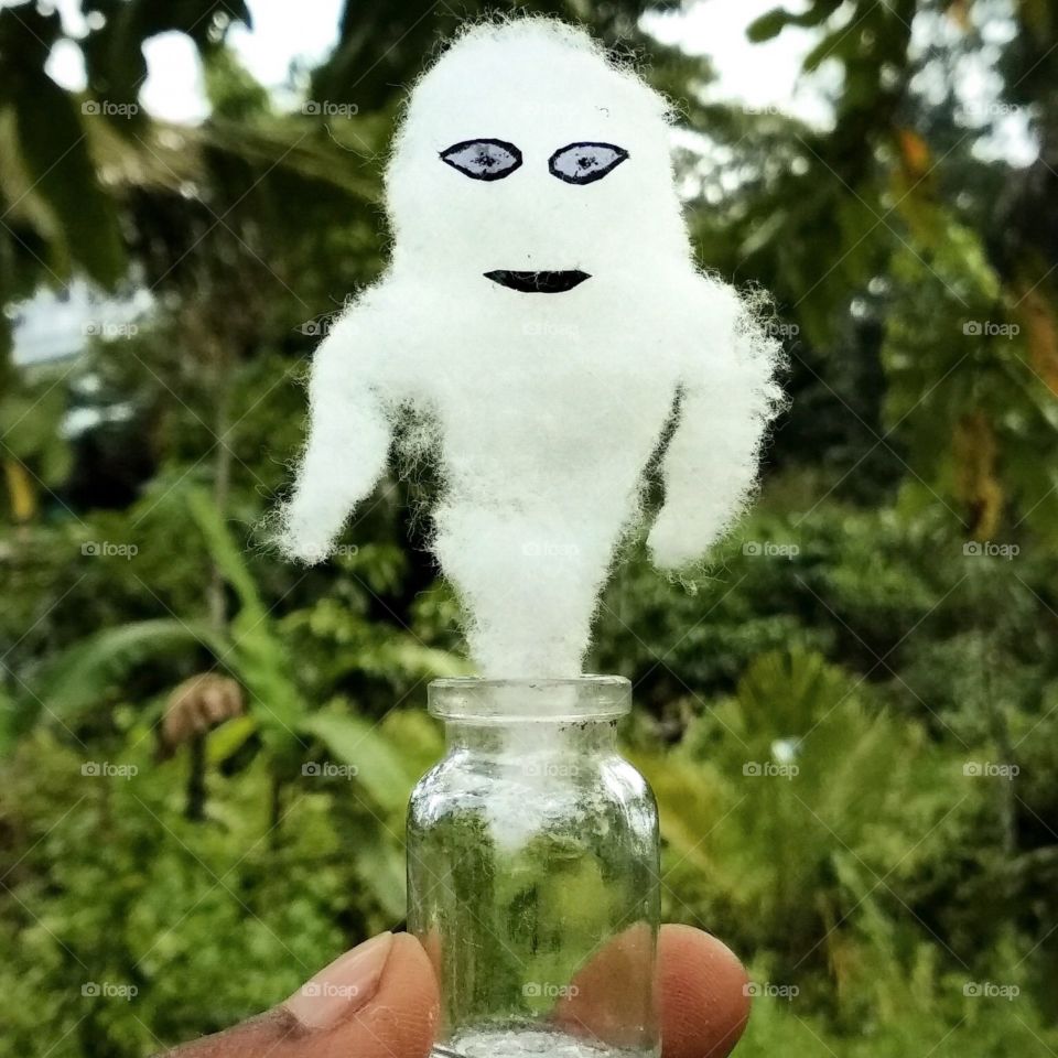 Ghost from bottle exploring the nature