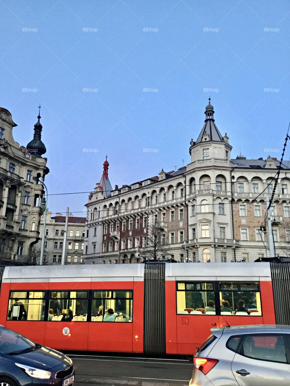 People in Windows - People riding through the city in the train 