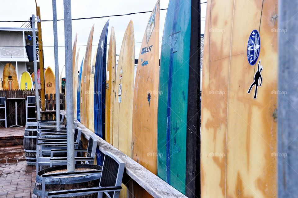 Montauk Surfboards. Montauk beach on Long Island, New York with a vintage surfboard wall. 
zazzle.com/Fleetphoto