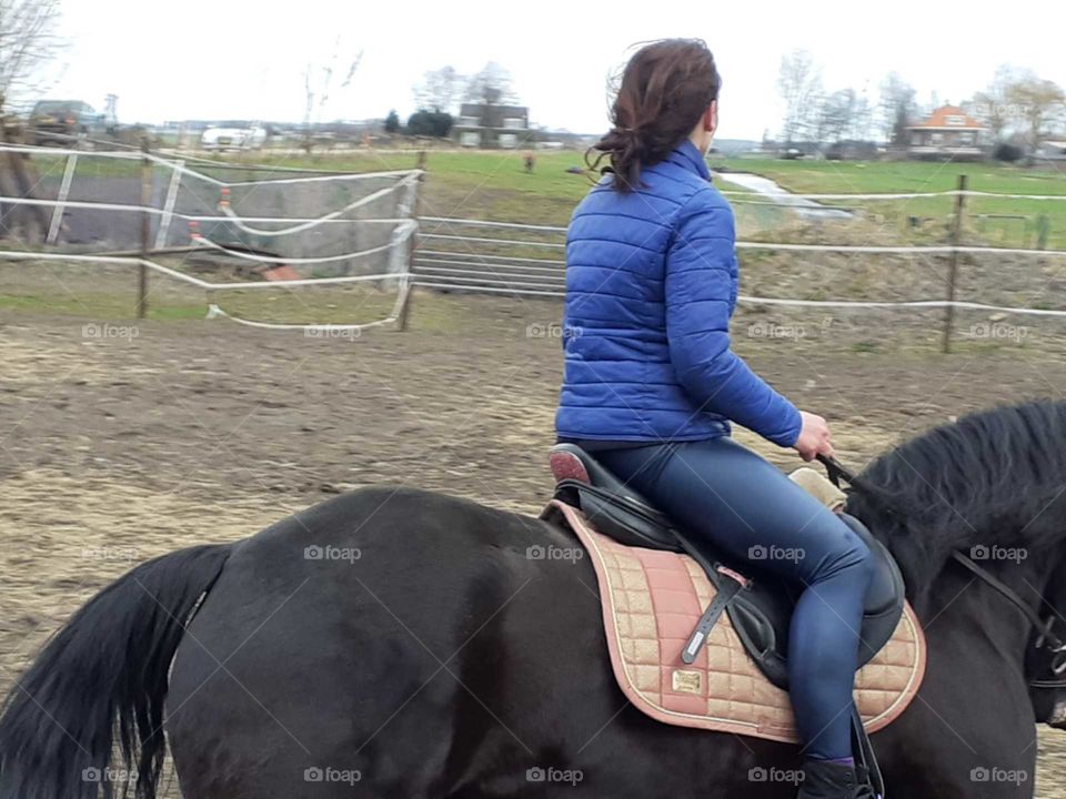 Riding in the outside arena