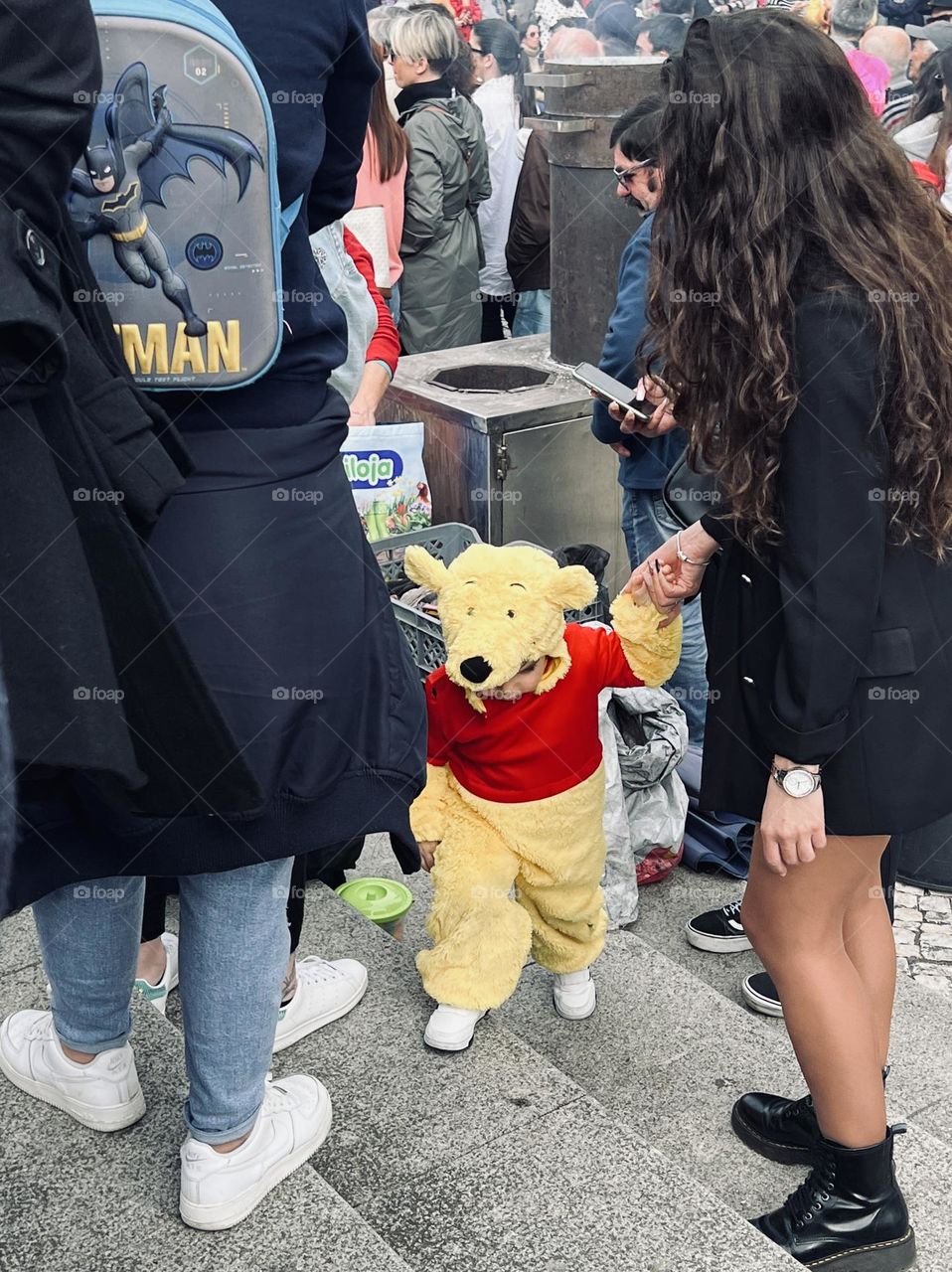 Kid in Pooh costume 