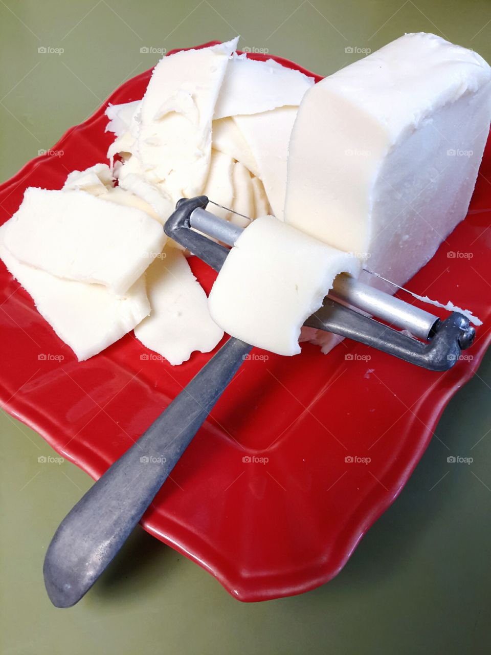 Mozzarella cheese and cheese slicer