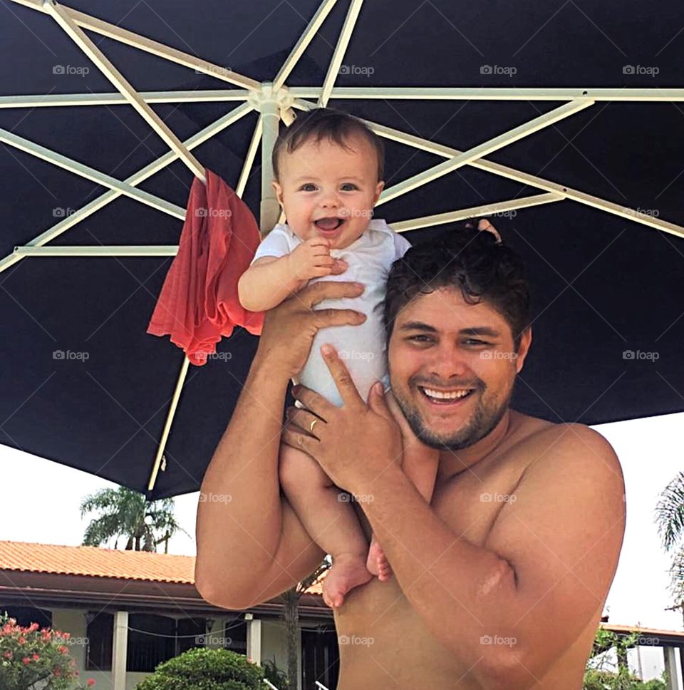 Father with son on his shoulder