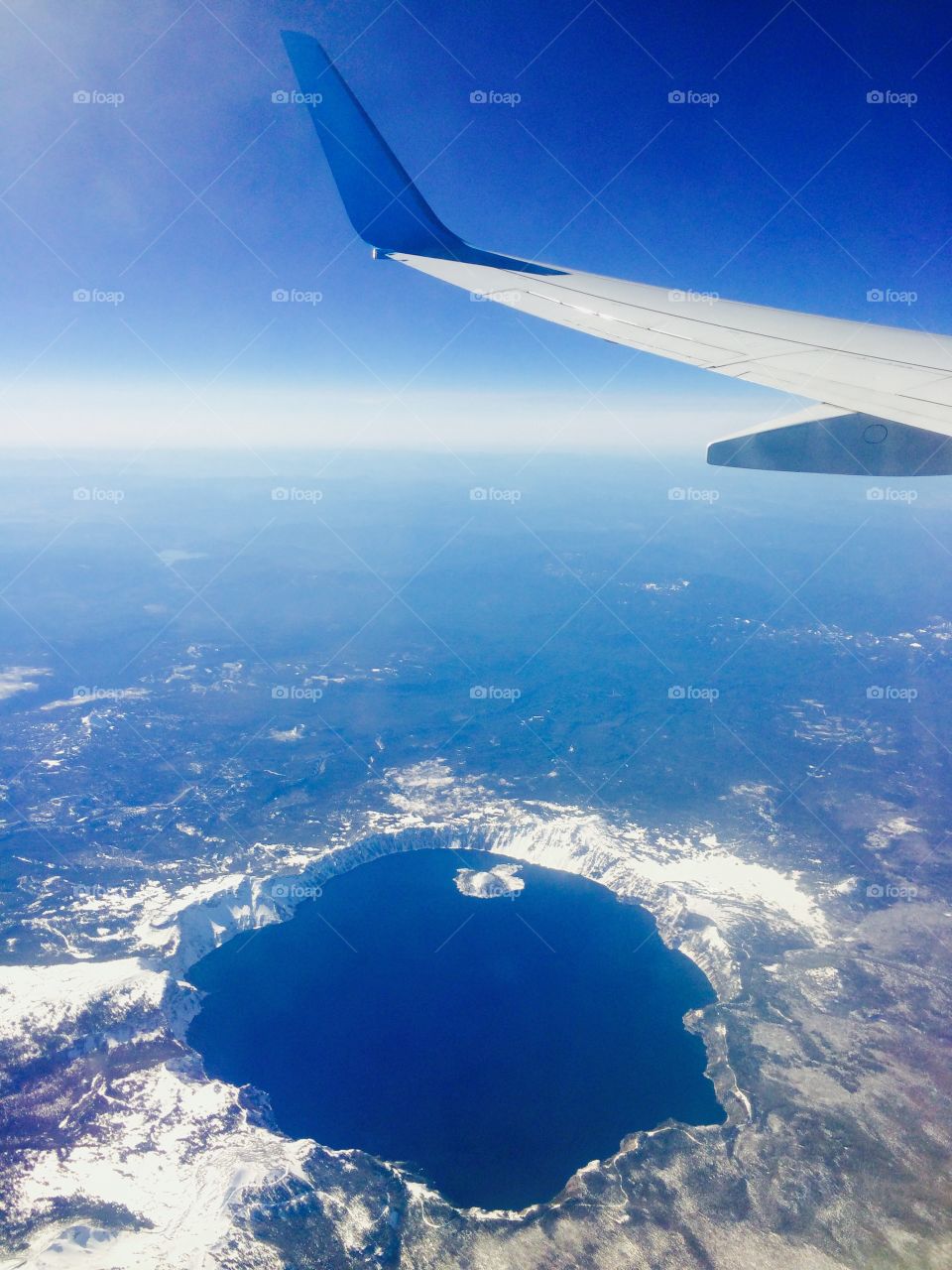 Crater Lake from the Air. Flying back from Palm Springs on Alaska Airlines and got this amazing view of Crater Lake!