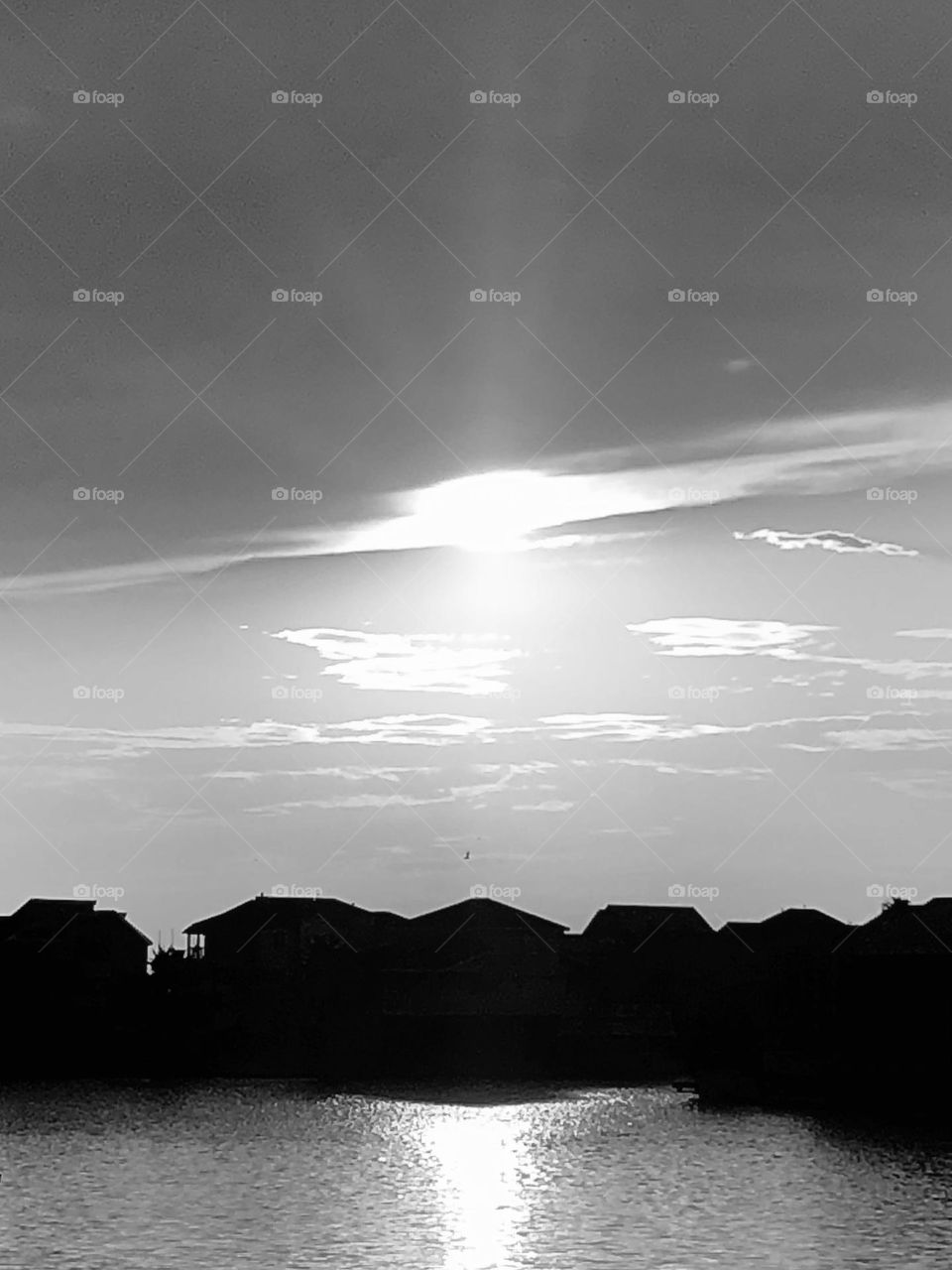 Black and white sunset from the deck of the bay house across the canal in Texas. 