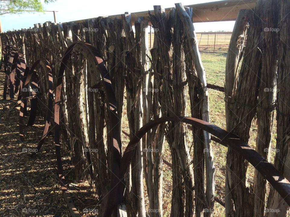 Rustic fence against a fading sun, Nebraska 