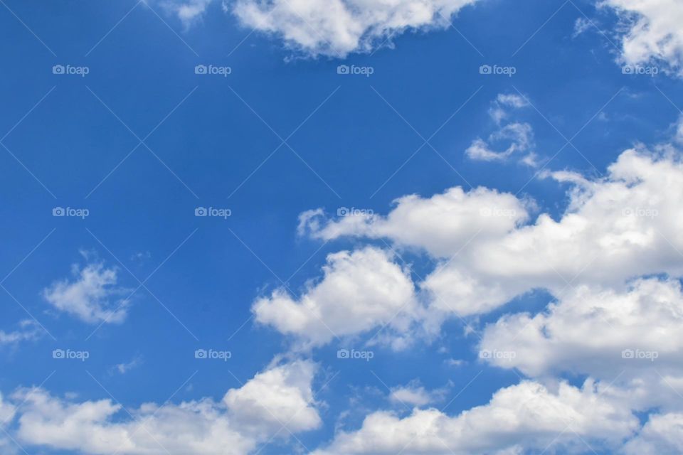 Blue sky and clouds in the morning.  Beautiful summer sky.