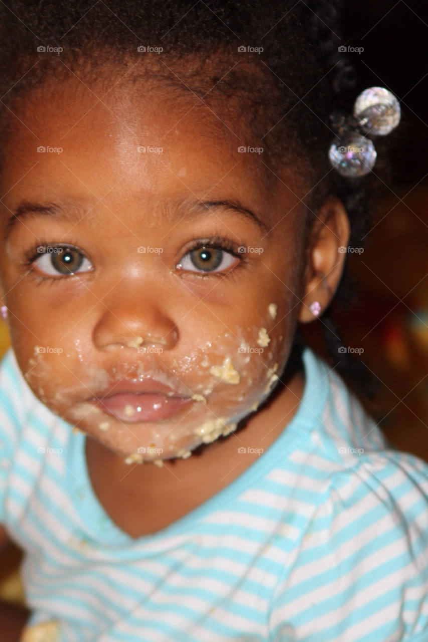 green eyes baby eating oatmeal on face by briwnskin371