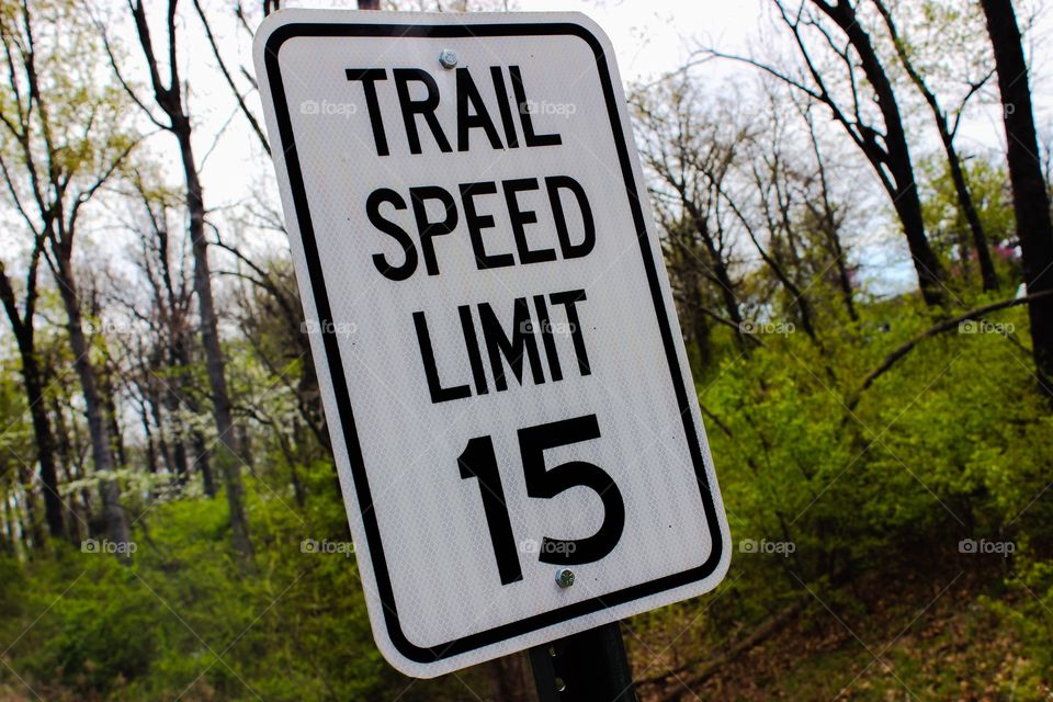 Walking trail speed limit sign