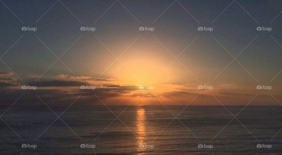 Sunlight reflected on sea during sunset
