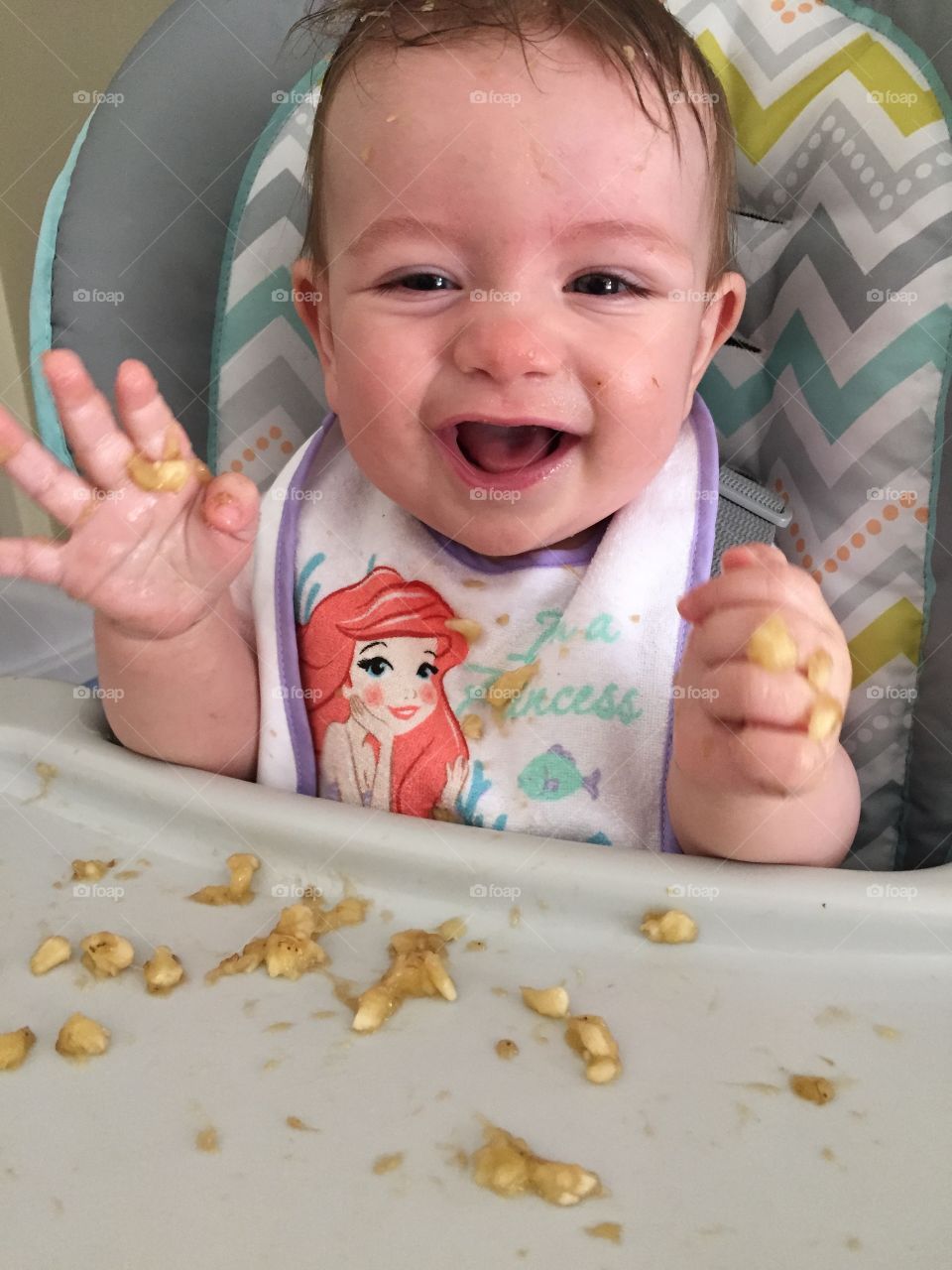 Bananas are messy food for baby! How fun.