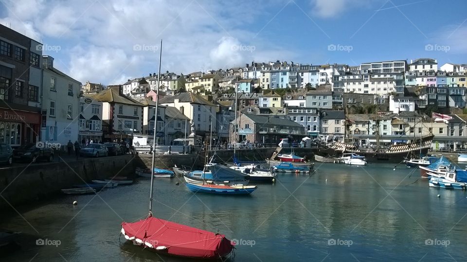 A fabulous overview of lovely Brixham, taking in lots of regular boats and picturesque houses in the hilltops, that sell it for this beautiful town.