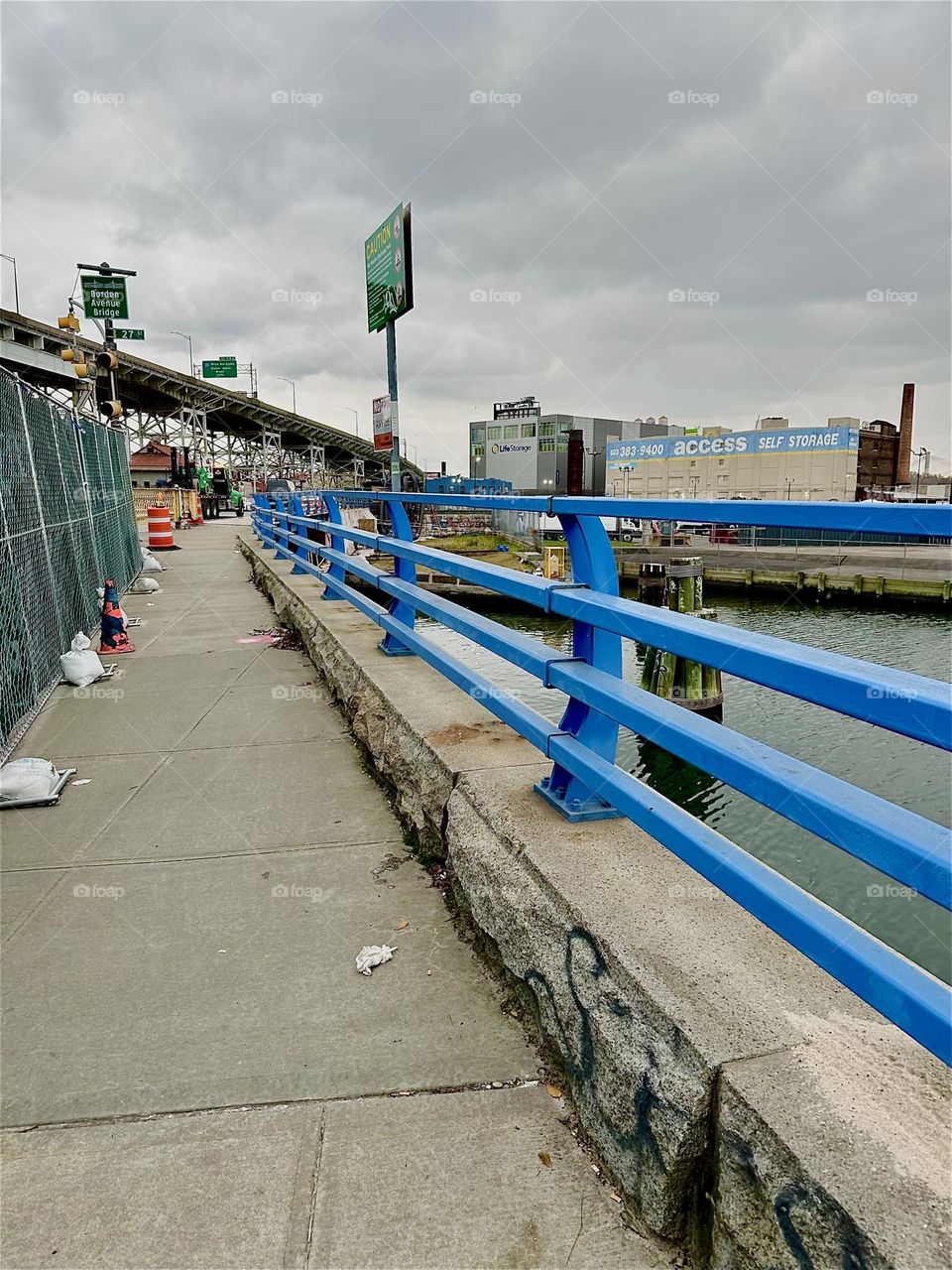 This is the “Borden Avenue Bridge” over “Dutch Kills”, an ocean inlet of the “East River” in LIC, Queens on an overcast day in December 2023. On the left the curved trajectory of the “BQE” winds its way into the distance. Hypnotic Productions