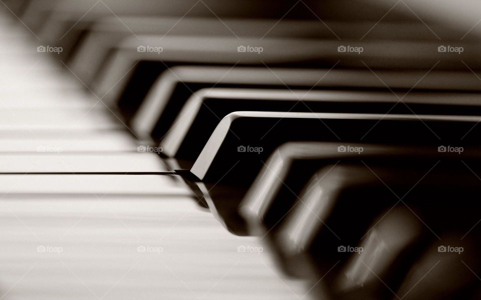 Piano (also known as pianola) is a self-playing piano, containing a pneumatic or electro-mechanical mechanism that operates the piano action via pre-programmed musicrecorded on perforated paper, or in rare instances, metallic rolls, with mor