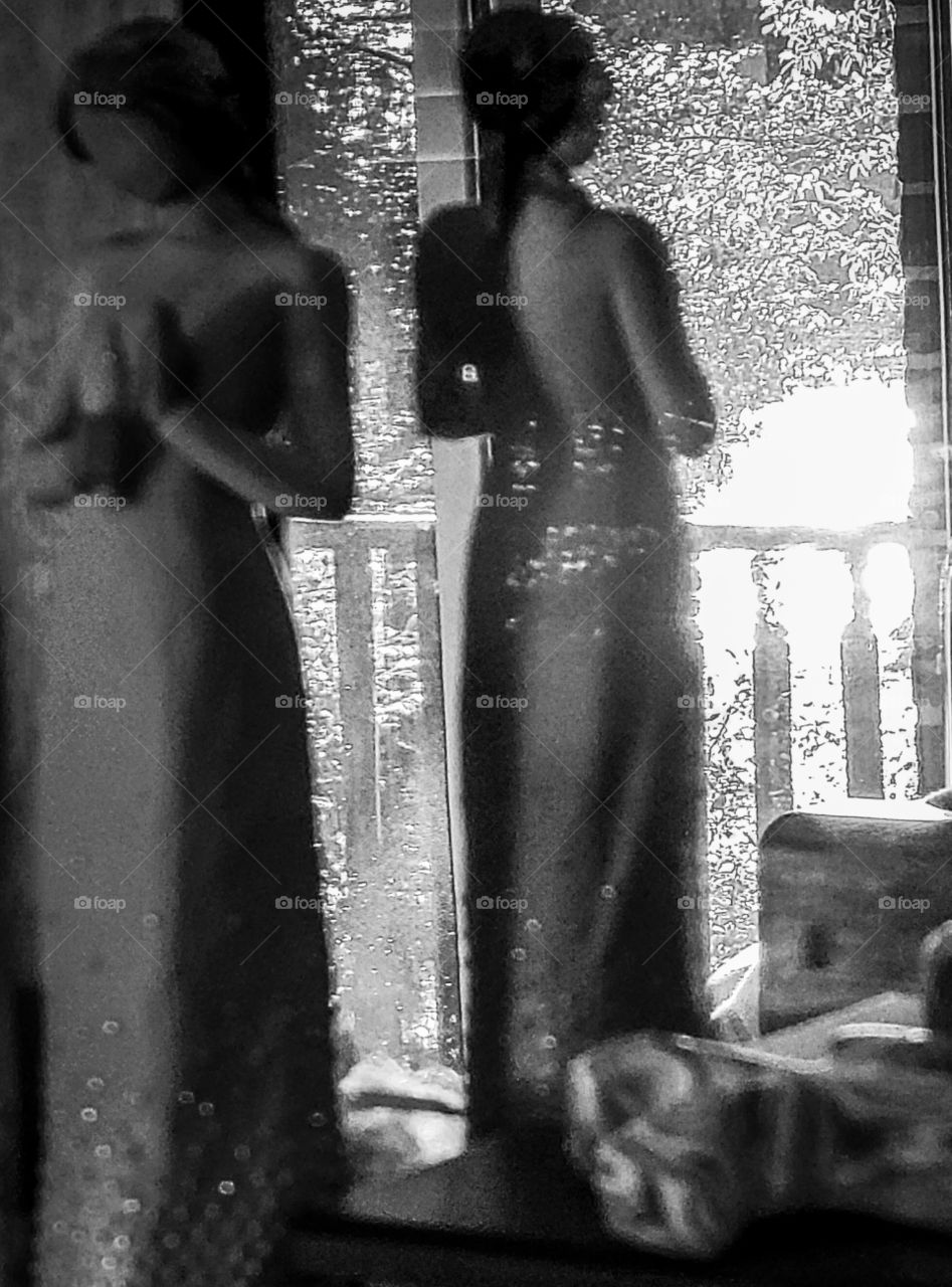 b/w standing vigil reflection in the mirror