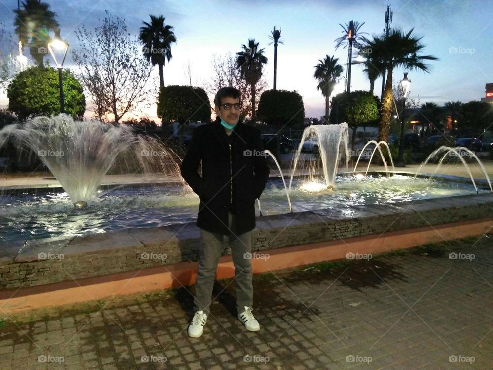 I m standing near a fountain