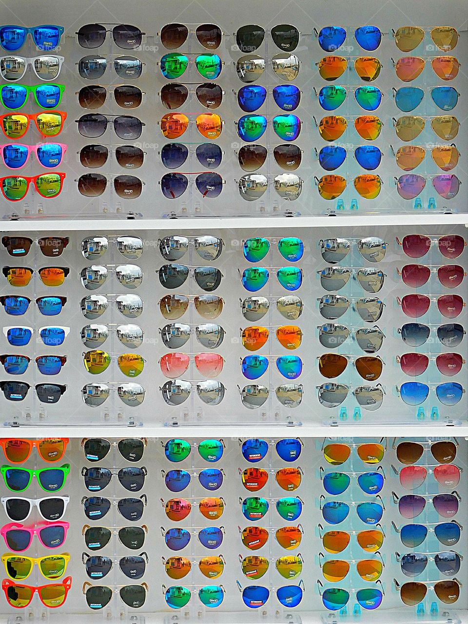 Multiverse  - Selection of multicolored sunglasses. Which one do you like? 