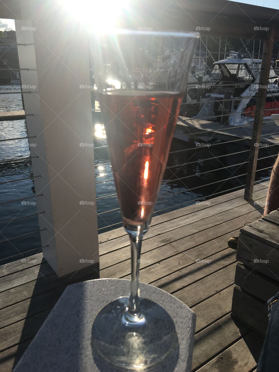 Sparkling glass of Rose' in the sun 