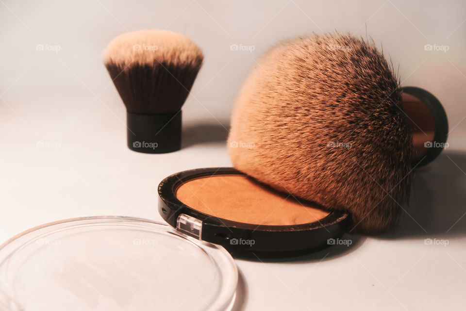 Female products powder and brushes