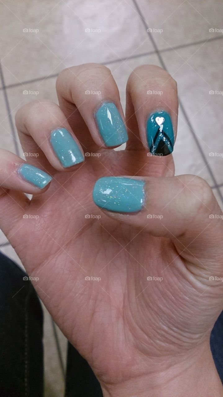 My nails. My mom does nails for a living (yes, I'm Vietnamese) and the benefit of having a nail technician as a mom, I get to have nice nails.