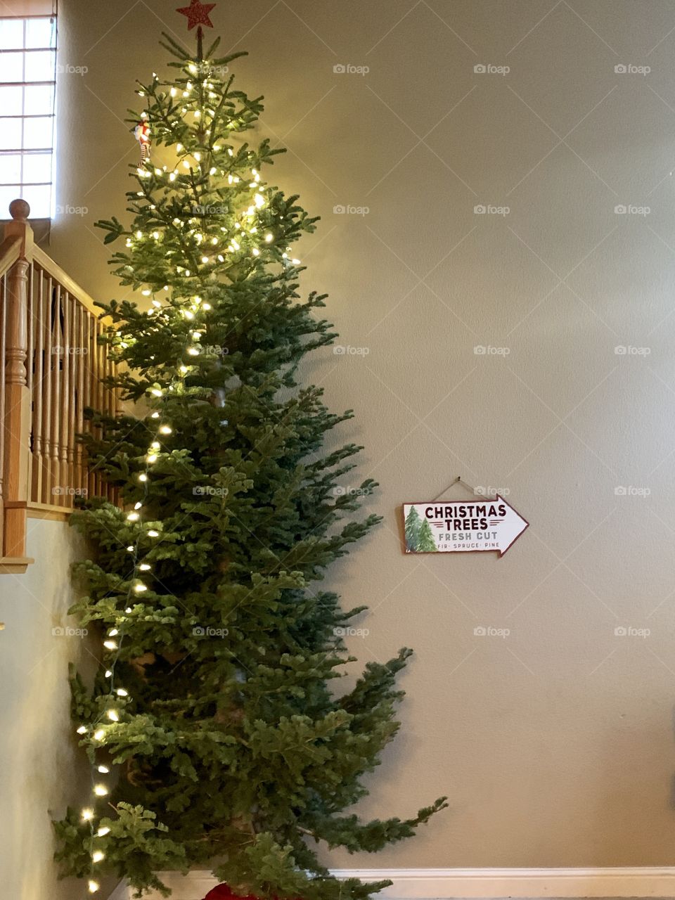 Christmas tree with lights - decorating for Christmas USA, America 
