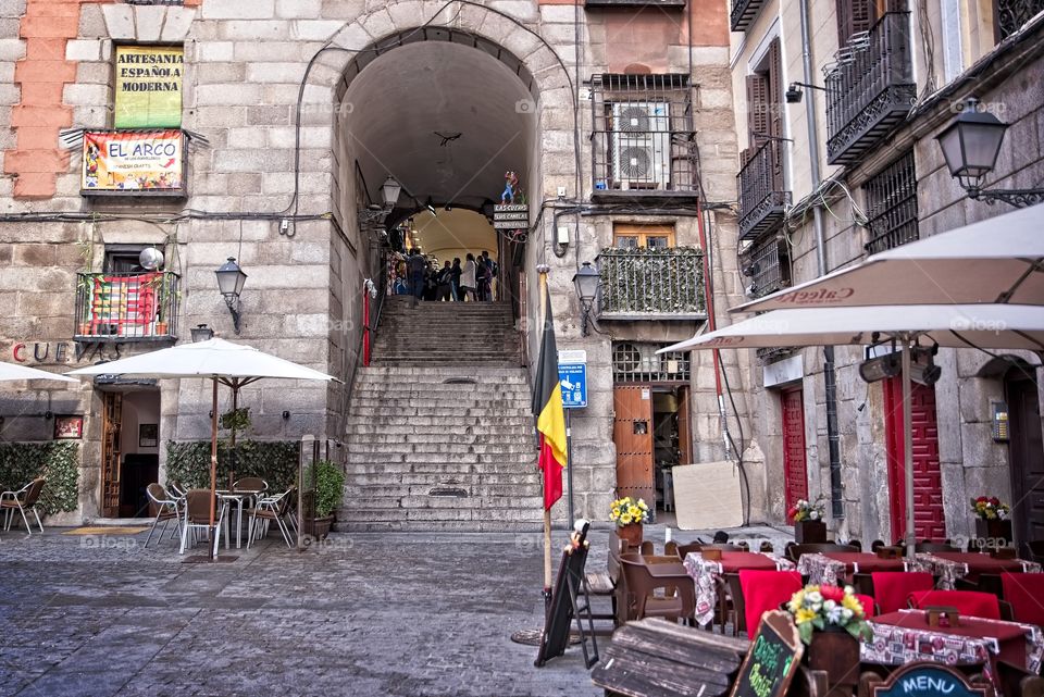 Typical arch and restaurant in Plaza Mayor of Madrid