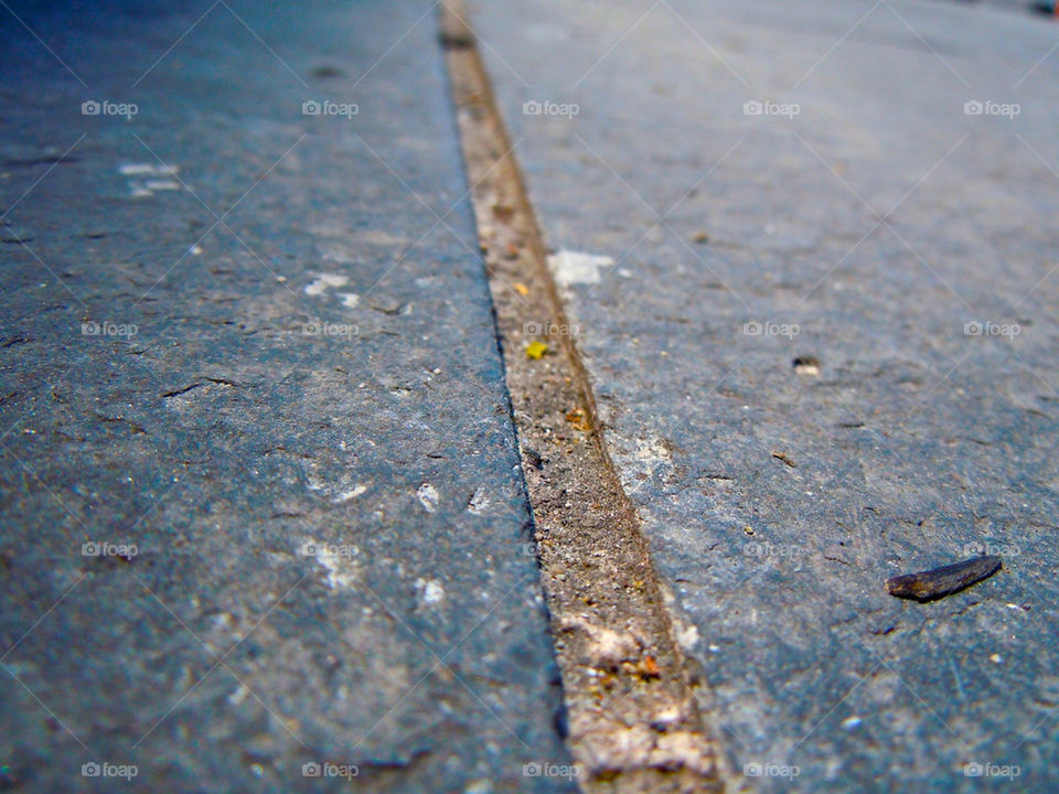 city dirt stone sidewalk by lbaro
