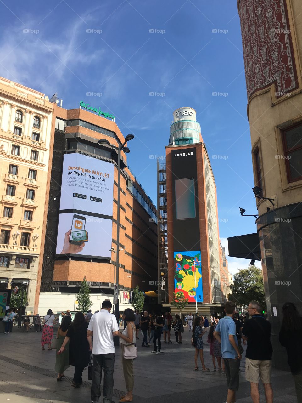 Callao, Madrid is where the city comes to life. The 42nd Street of Madrid. Tall building and active city life. 