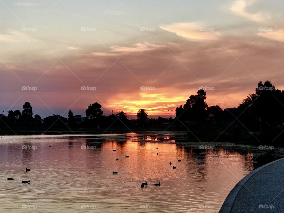 Watching another great sunset while walking around the lake
